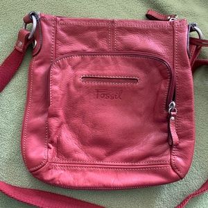 Crimson Fossil crossbody leather bag